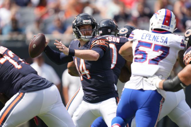 CHICAGO, IL - AUGUST 21: Chicago Bears quarterback Andy Dalton (14) throws the football during a preseason game between the Chicago Bears and the Buffalo Bills on August 21, 2021 at Soldier Field in Chicago, IL.