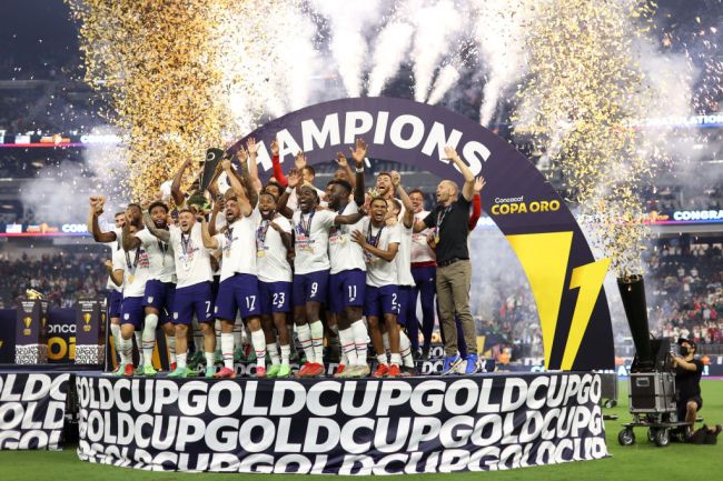 LAS VEGAS, NV - AUGUST 1: USMNT players including Sebastian Lletget #17 raise the Gold Cup trophy during a game between Mexico and USMNT at Allegiant Stadium on August 1, 2021 in Las Vegas, Nevada.