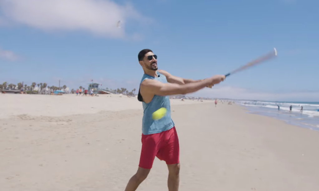 Enes Kanter hitting a baseball