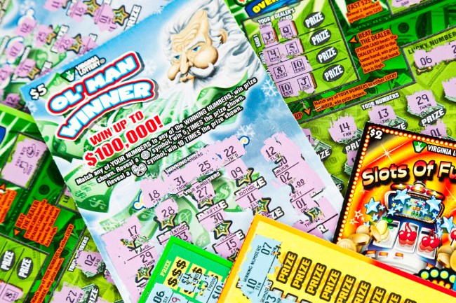 Father, Ali Jaafar, and sons, Mohamed and Yousef Jaafar, charged with more than a dozen counts of fraud, money laundering and tax evasion over an alleged ticket-cashing scheme involving scratch-off lotto and lottery tickets sold at convenience stores. 