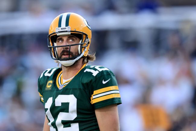 Aaron Rodgers positive test COVID-19 nfl protocol vaccine