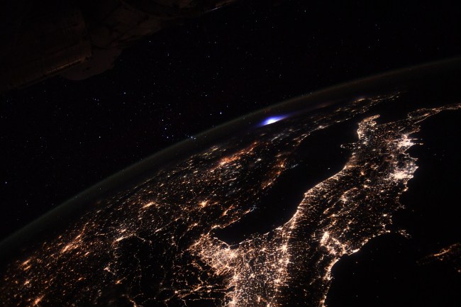 European Space Agency ESA astronaut Thomas Pesquet took photo of blue light from International Space Station ISS as transient luminous event.
