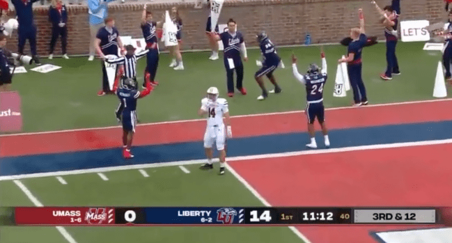 Liberty Football Cheerleader Catch Megaphone