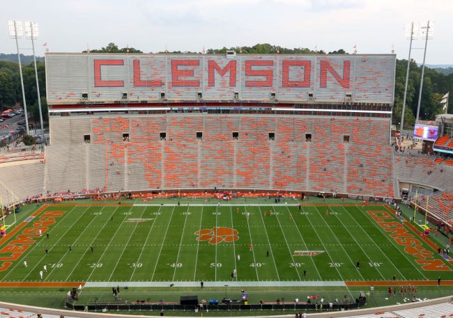 clemson football player burns house down