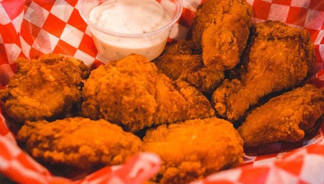 woman finds fried chicken head wings