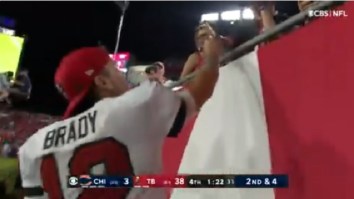 Kid With ‘Tom Brady Helped Me Beat Brain Cancer’ Sign Couldn’t Hold Back Tears After Receiving Hat From Tom Brady