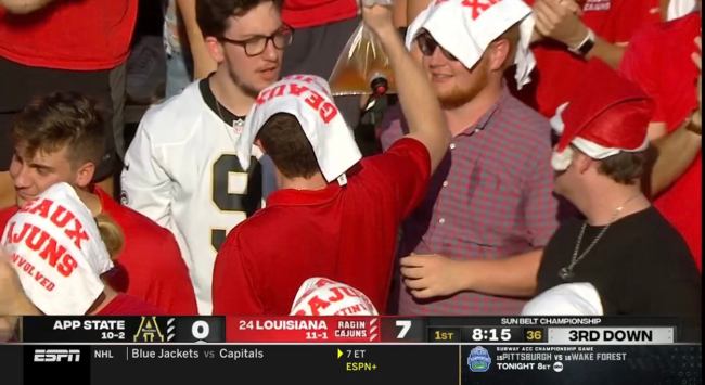 Louisiana-Lafayette Ragin Cajuns fans slapping the bag sun belt championship