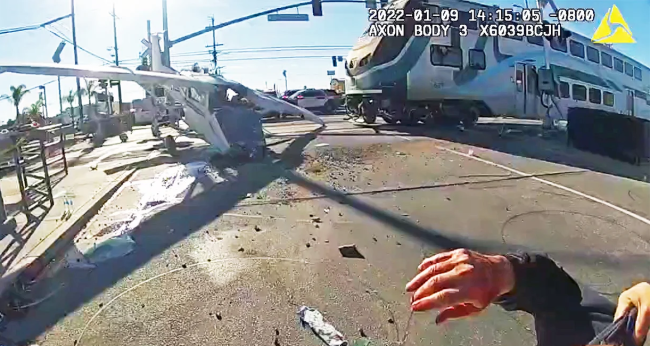 Pilot Pulled From Crashed Plane Seconds Before Train Pulverizes It