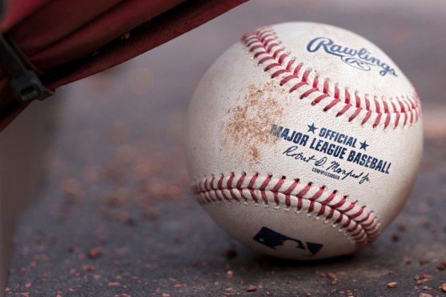 Reds Fan Pulls Off All-Time Foul Ball Catch While Bottle-Feeding Baby