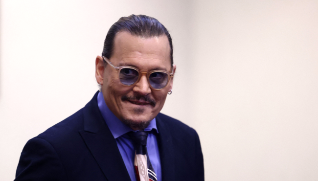 Bizarre TikTok Video Of People Throwing Gifts At Johnny Depp Goes Viral