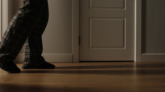 man in pajamas sleepwalking