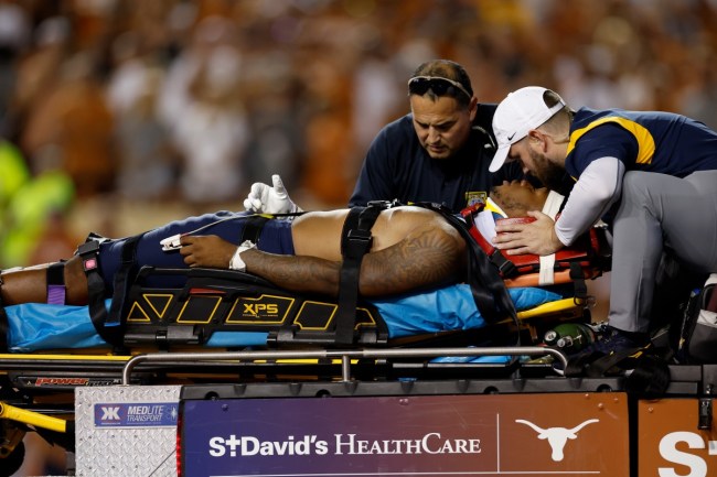 West Virginia Star Freshman Running Back CJ Donaldson Taken Off Field On Backboard With Scary Injury