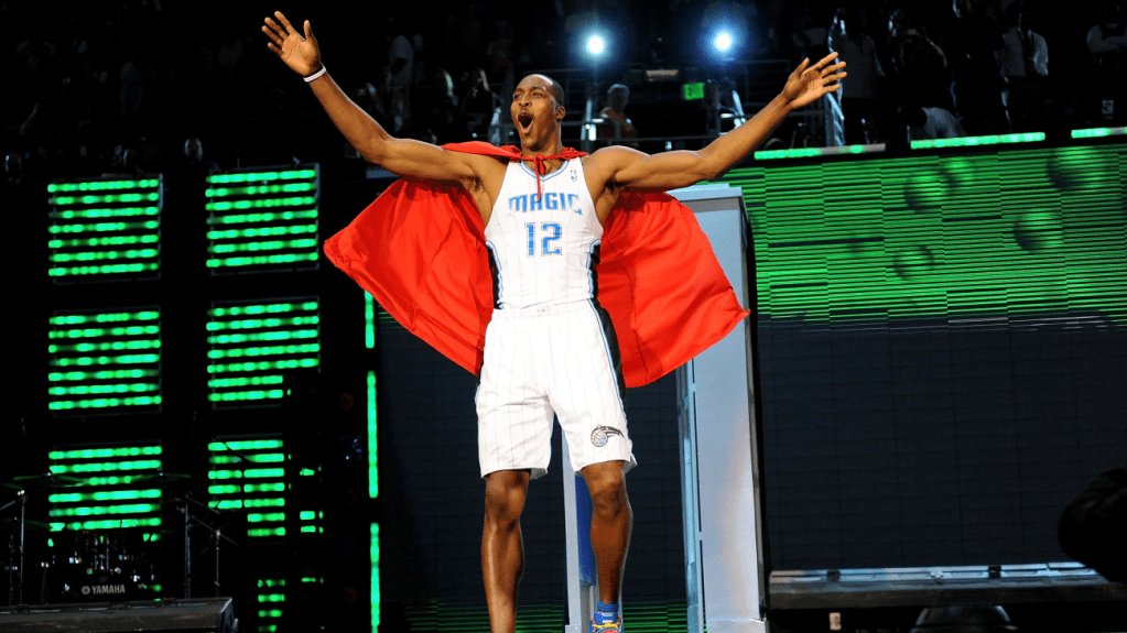 Dwight Howard wearing red cape