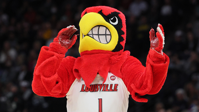 Louisville Basketball Fan Reads Newspaper Instead Of Watching Game