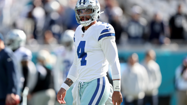 Dak Prescott walks off the field.
