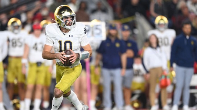 Drew Pyne rolling out for Notre Dame
