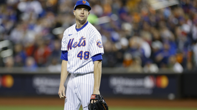 Jacob deGrom walks off the mound.