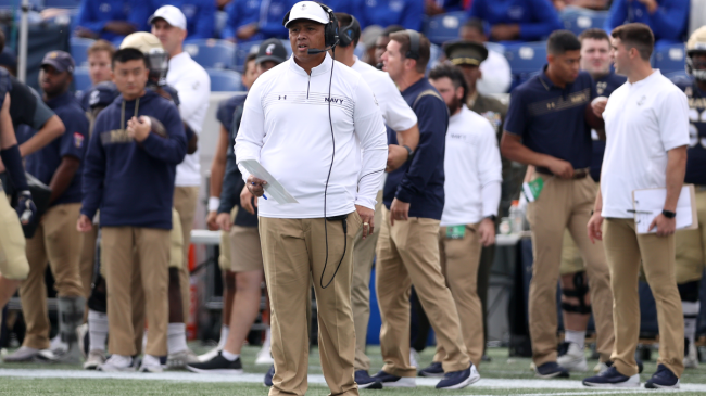 Ken Niumatalolo looks on from the Navy sideline.