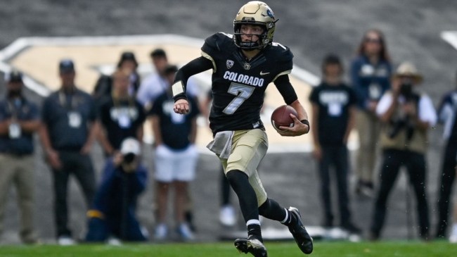 Owen McCown running with the football