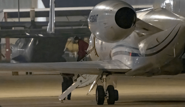 brittney griner exits plane