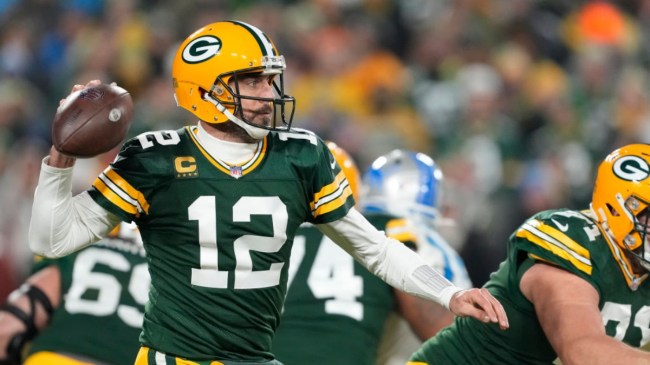 Aaron Rodgers with the football