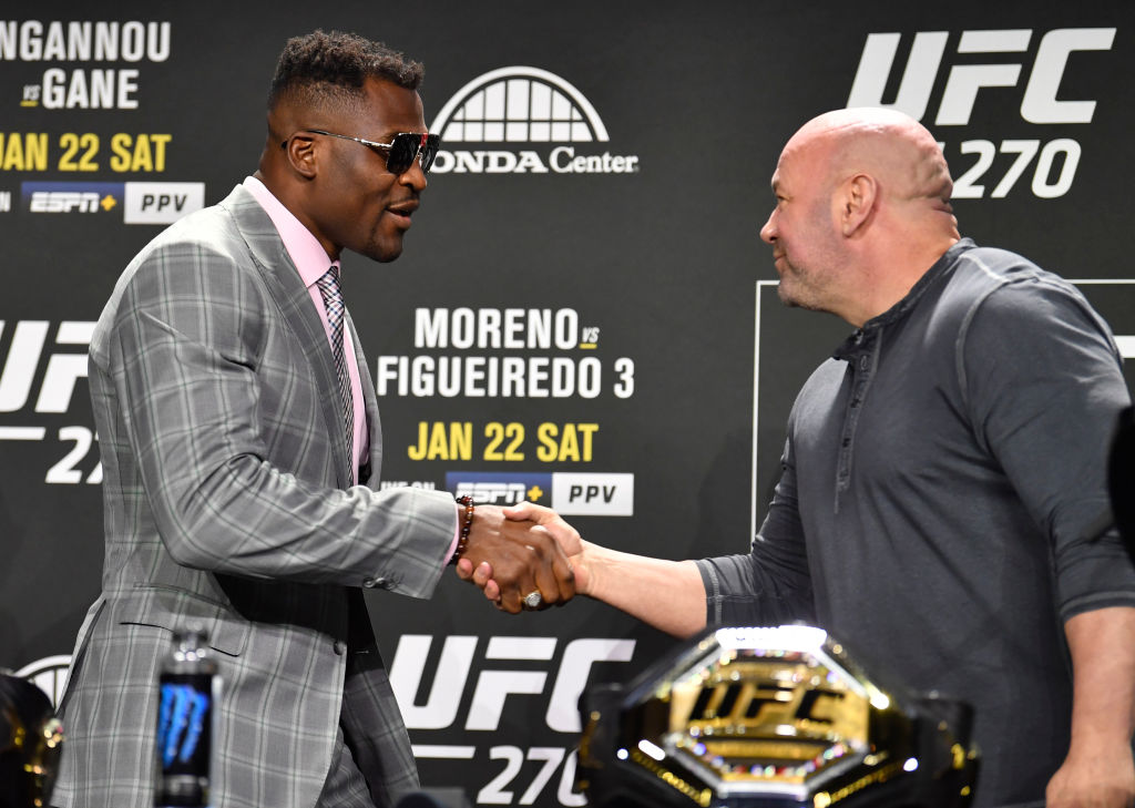 Francis Ngannou and Dana White exchange