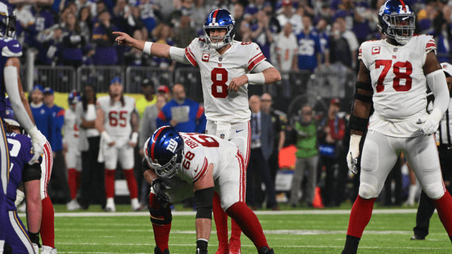 The New York Giants offense lines up on the field.