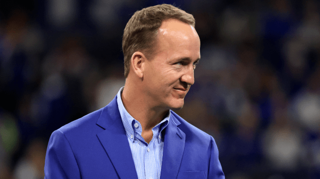 Peyton Manning accepts an award.