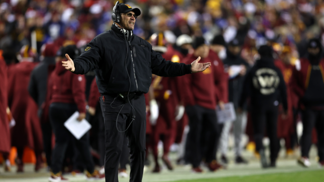Ron Rivera coaches from the sidelines.