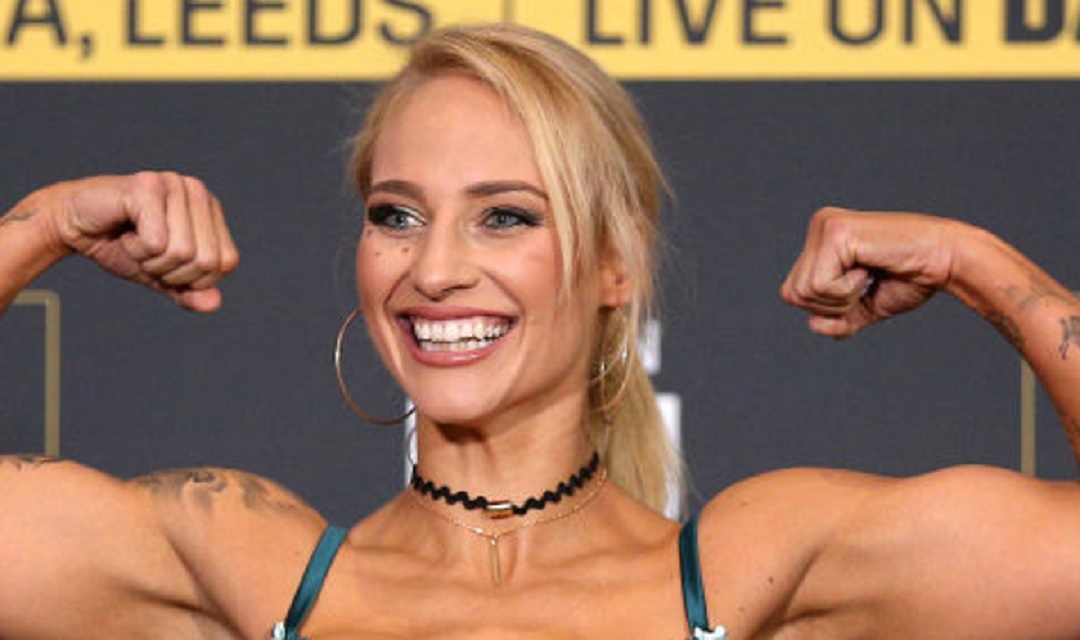 Ebanie Bridges flexing at weigh-ins