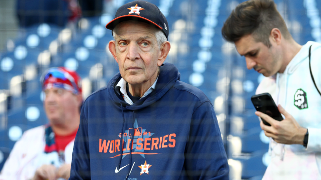 Mattress Mack watches an Astros game.