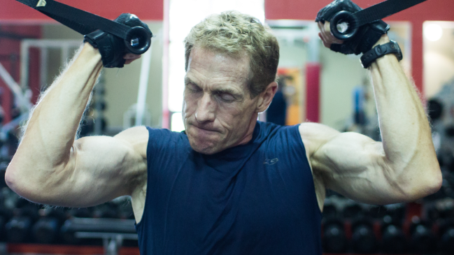 Skip Bayless lifting weights