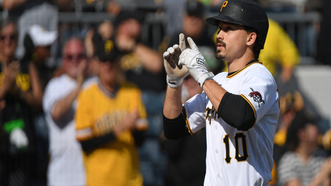Bryan Reynolds crosses home plate.
