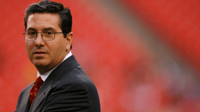 Dan Snyder walks the field.