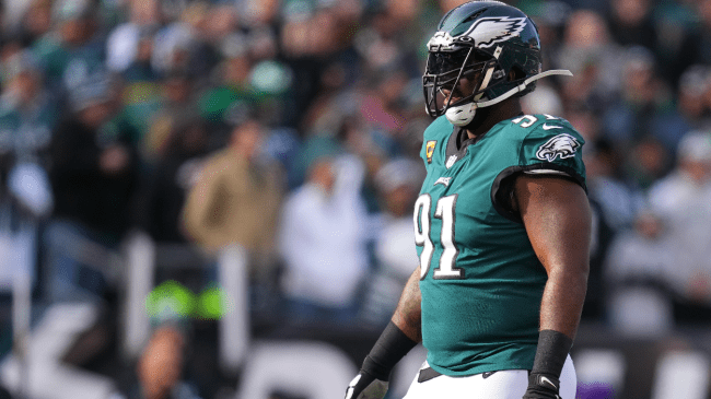 Fletcher Cox walks onto the field.