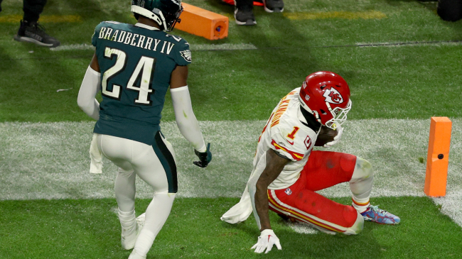 Jerick McKinnon slides at the goal line.