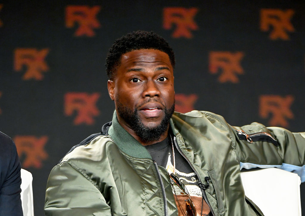 Kevin Hart sitting couch