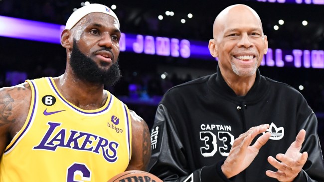 LeBron James poses with Kareem Abdul-Jabbar after breaking NBA scoring record