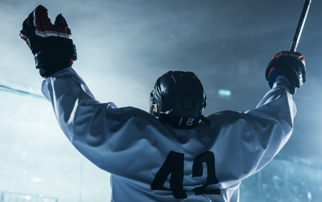 minor league hockey player celebrates
