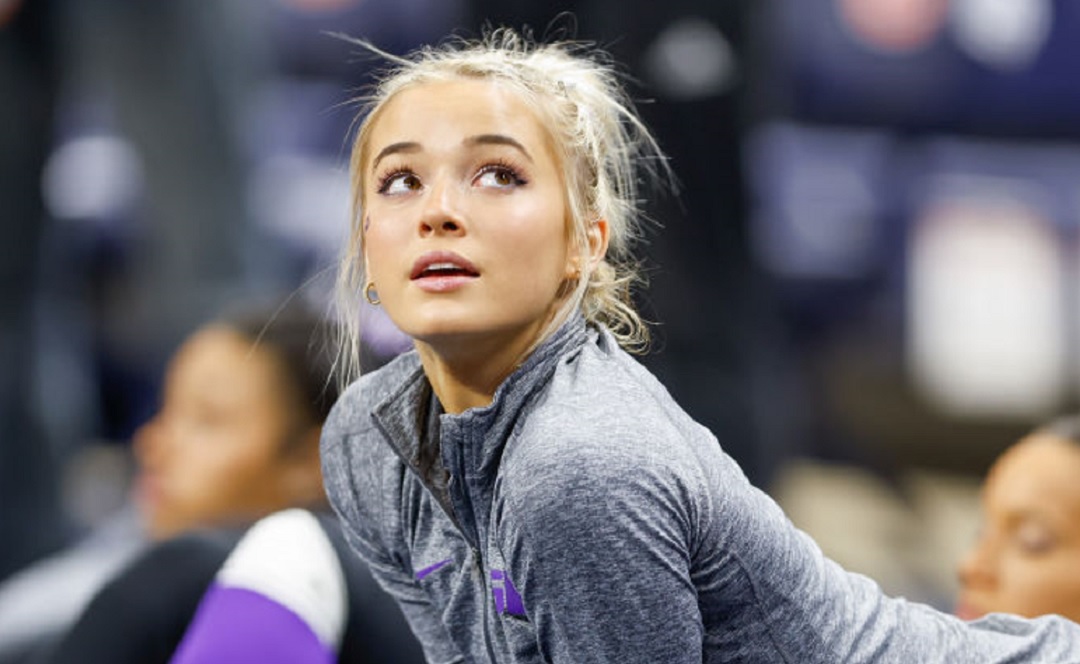 Olivia Dunne staring at scoreboard
