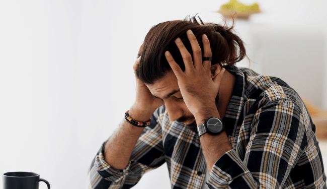 Man With Hangover Steps To Avoiding Sleep Expert
