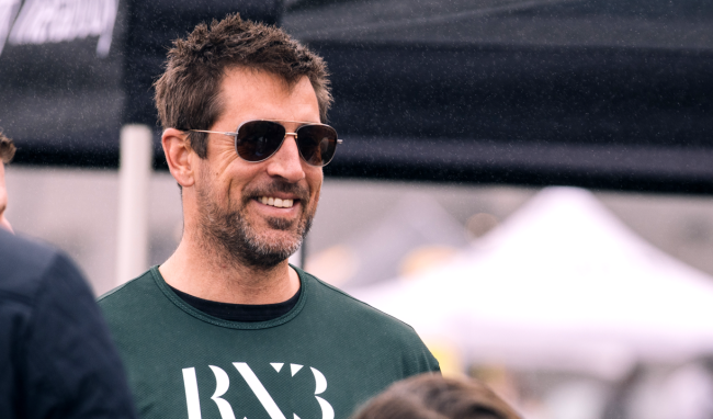 aaron rodgers charity flag football jason kelce travis jets hostage