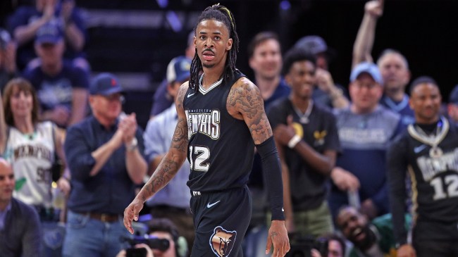 Ja Morant stands on the court.