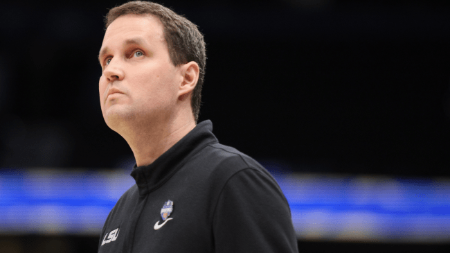 Will Wade looks on from the sidelines.