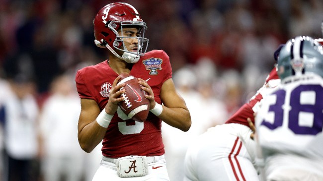 Bryce Young drops back to throw a pass in Alabama's bowl game.