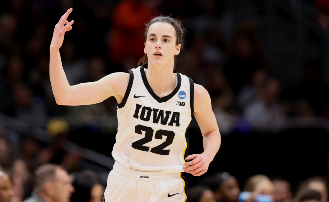 caitlin clark holds up three fingers net worth
