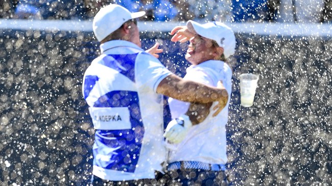 Chase Koepka celebrates after hitting a hole-in-one