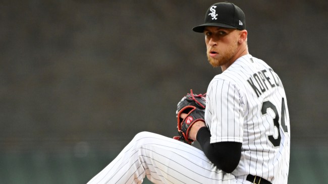 Michael Kopech winds up for a pitch against the Giants.