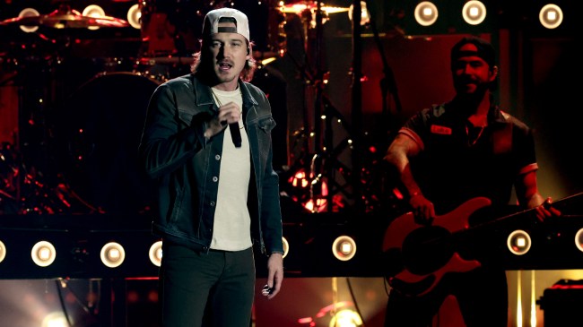 Morgan Wallen performs on stage.
