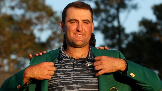 Scottie Scheffler receiving his green jacket at The Masters